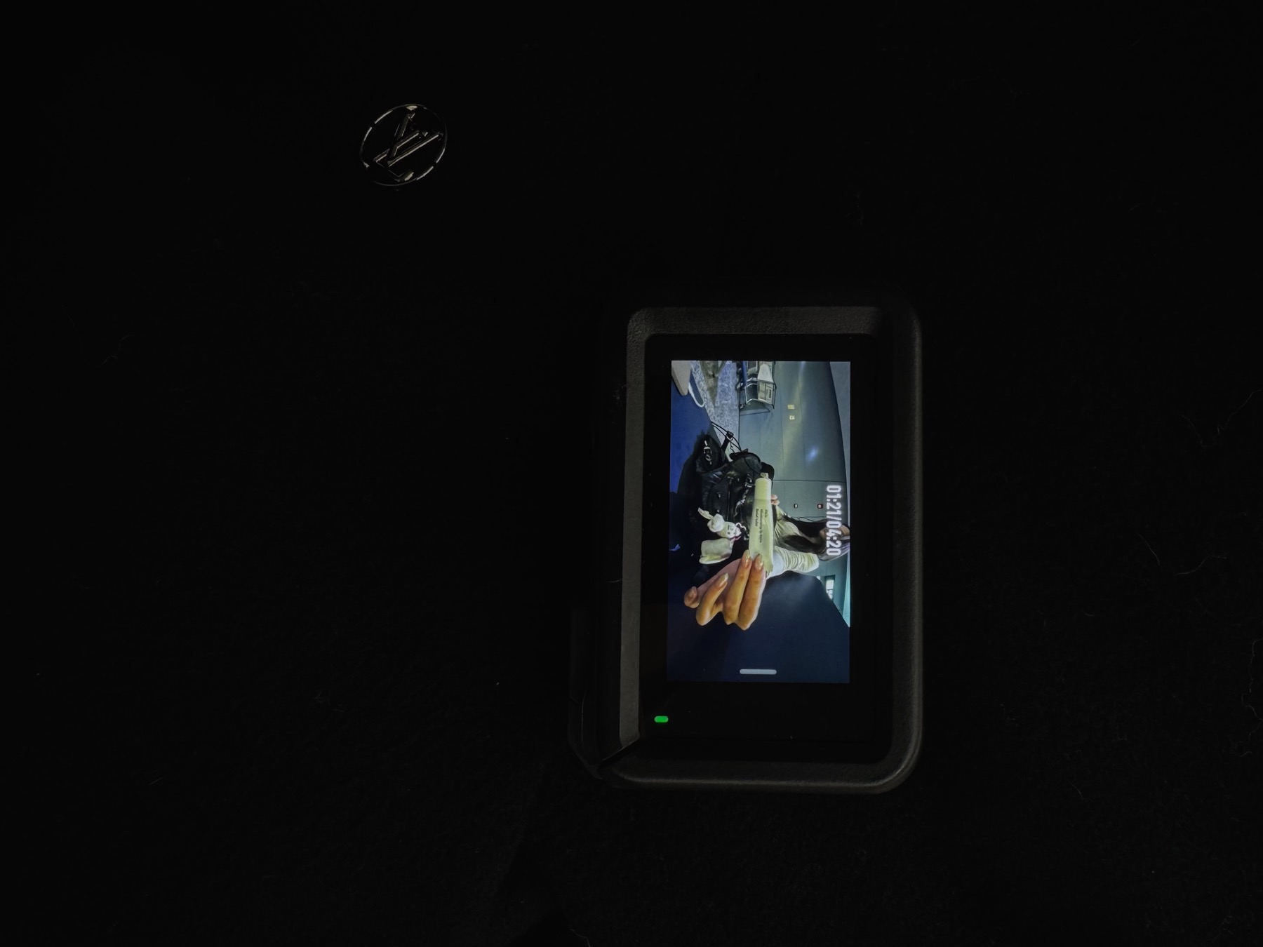 A camera screen in the dark